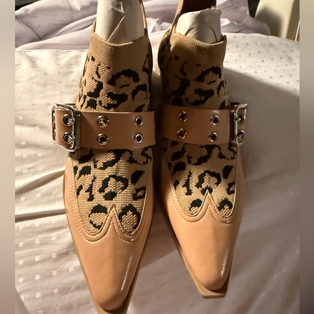 BRand new Leopard Print Tan Ankle Boots. Slip on style.